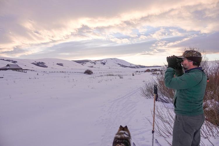 John Bishop birding in snow: Beth Cook photo