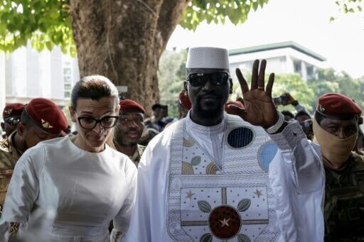 Guinean President Mamady Doumbouya and his wife before voting in Conakry in December 2025, in an election in which all major opponents were barred