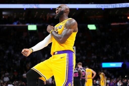 Los Angeles superstar LeBron James reacts in the fourth quarter of the Lakers' NBA win over the Miami Heat