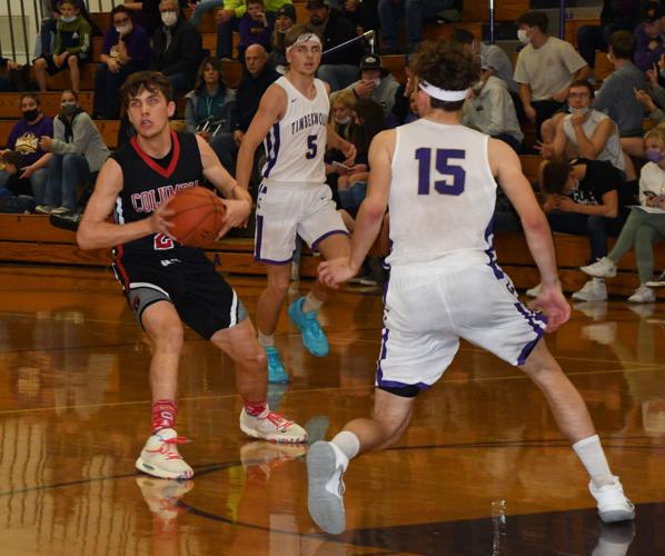 CHS Ben Allen#24 passing ball to Dylan Connely #14 and Carson Lanz#42 coming up court.JPG