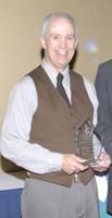 Wilcox wins distinguished service award