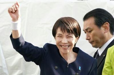 Japan's Prime Minister and President of the Liberal Democratic Party Sanae Takaichi (L) has called a snap election for a stronger mandate