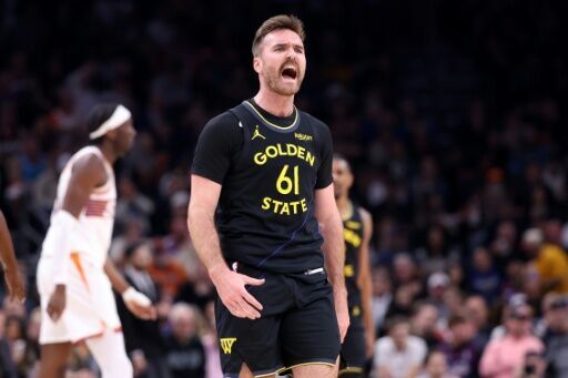 Golden State's Pat Spencer reacts after hitting a three-pointer in the Warriors' NBA victory over the Phoenix Suns