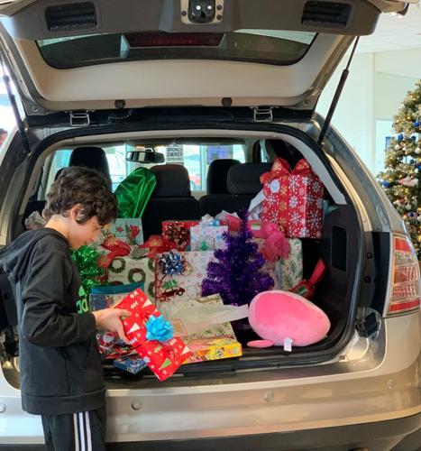 Stevenson family gifted reliable vehicle by Underriner Ford/Nissan