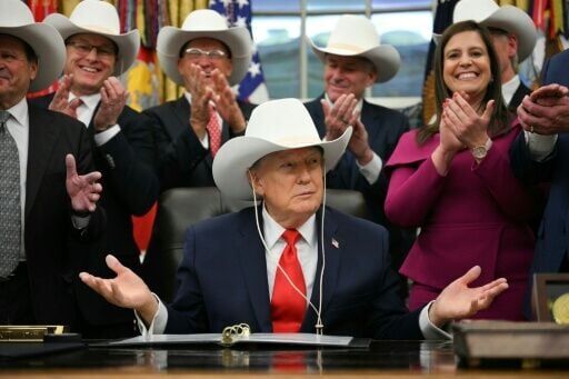 US President Donald Trump, seen in a cowboy hat during a bill signing ceremony in December 2025, has declined to endorse in the Texas's Republican Senate primary