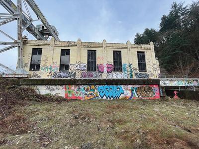 The powerhouse building, originally built in the very early 1900s, is now covered in graffiti and filled with trash. The county is considering boarding it up. 	Laurel Brown photo