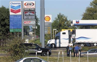 Officer shoots woman at Oregon gas station
