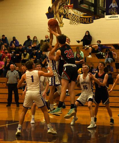 CHS Bryson Sauter #20 blocking with Jace Greewood #12 in front and Chris Nelson #5 looking on.JPG