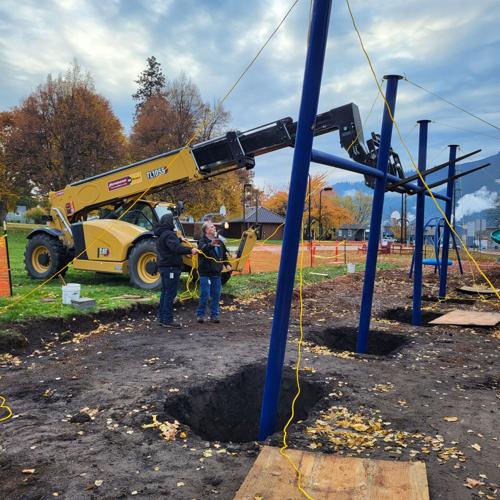 Insitu helping with swings.jpg