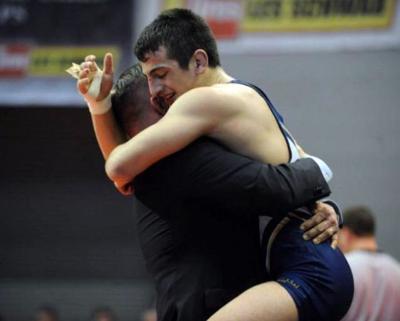 Jason Shaner takes first at 5A state wrestling meet, sets school record