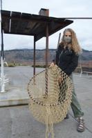Tie that binds: Artist renews fishing net on ‘Nchi’Wana’ tribal tribute sculpture