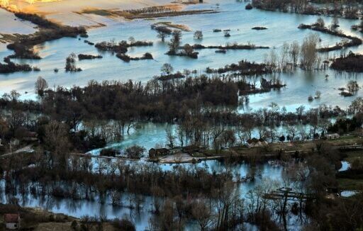 Severe weather conditions have caused at least eight deaths, with one man in Albania drowning in floods