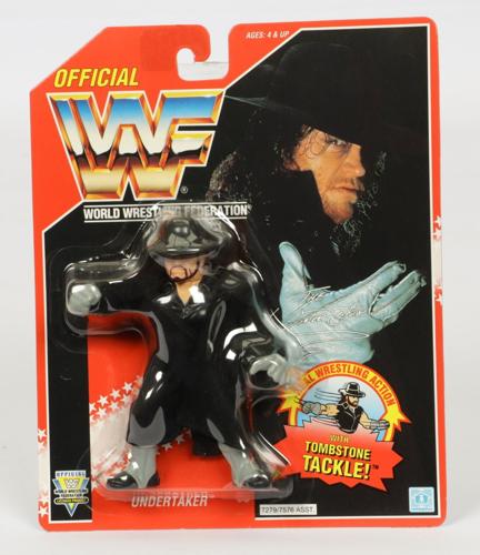 WWF wrestling figures from the 1990s fetch thousands of pounds at auction