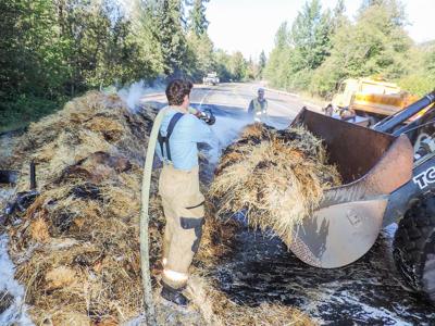Hay bales catch fire on moving trailer, closing part of Hwy. 35
