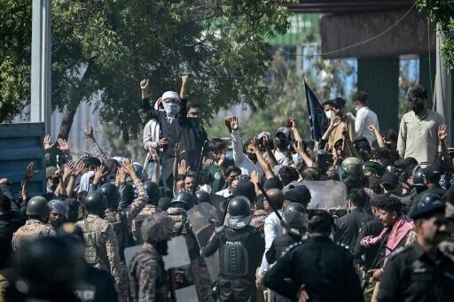 Shiite Muslims shout slogans during a protest outside the US consulate in Karachi on March 1, 2026