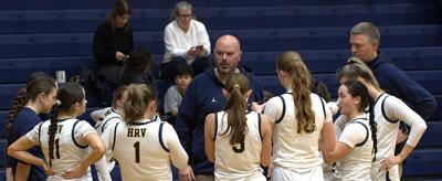 Hood River Valley Coach Zach Pauls talks with his team during a prior game.