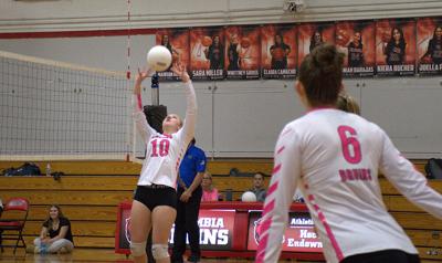 Bruin senior Julia Mullinix sets the ball last year.