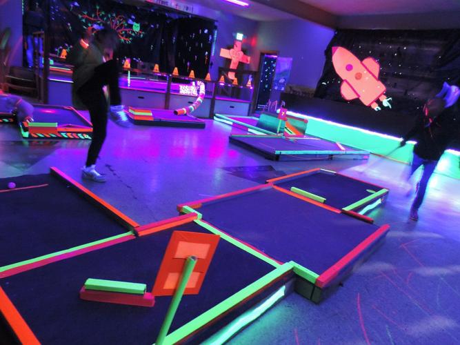 Neon golfers add a glow to Immanuel youth programs