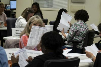Workers in the vote-by-mail processing area at the Orange County Registrar of Voters in Santa Ana, Calif., on May 27, 2026.