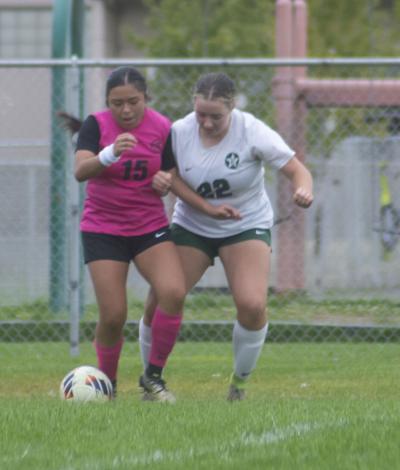 Jaki Negrete (15) fights for the ball for The Dalles in a match earlier this year                F. Martin Gibson photo