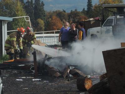Furniture burn pile brings down power line