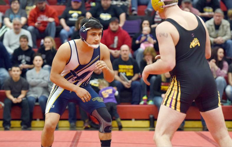 Eagles wrestling fourth at districts, sends five to state championships