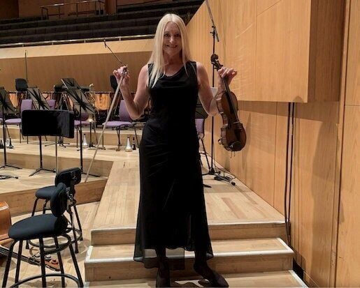 Cellist climbs 214 peaks in memory of late wife