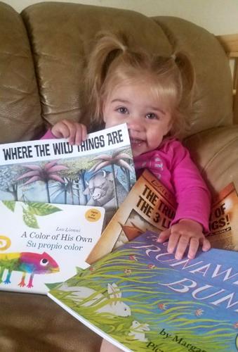 B1 KS First book tygh valley girl with books.jpg