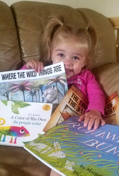 B1 KS First book tygh valley girl with books.jpg