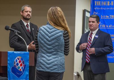 Caleb Berthelsen (left) and Judge John Wolf