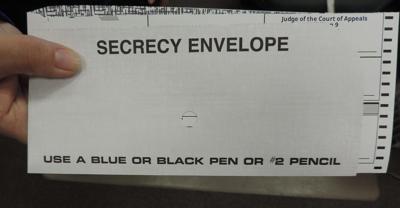 Ballots arrive, ‘sleeve’ and all