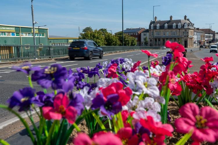Council uses fake plastic flowers to save cash and water