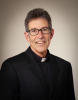 New priest retired from USFS