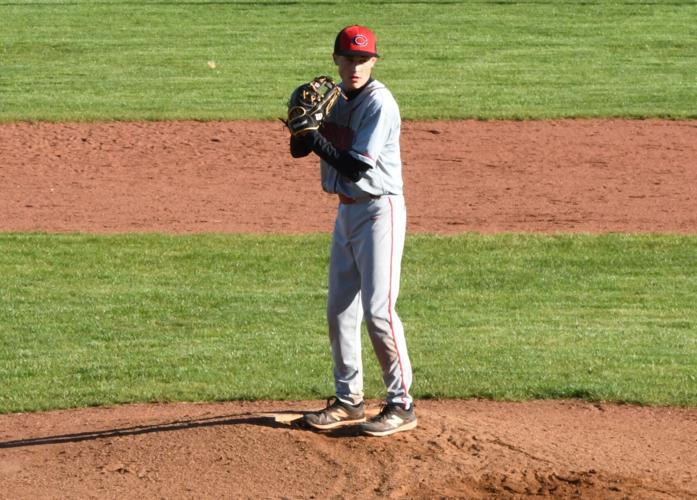 CHS Freshman Garrett Kock #9 prepares a pitchDSC_9709.JPG