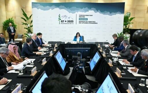 Canada's Foreign Minister Anita Anand (C) leads a G7+ session on maritime security during the G7 Foreign Ministers Meeting at the White Oaks Resort in Niagara-on-the-Lake, Canada on November 12, 2025