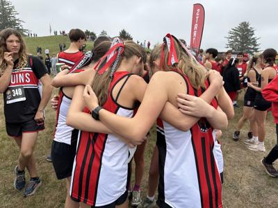 Columbia Bruin girls runner get ready for a race earlier this year     Contributed photo