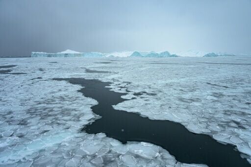 The Sarfaq Ittuk ferry navigates through the ice of Greenland's Disko Bay, not far from its final destination, Ilulissat