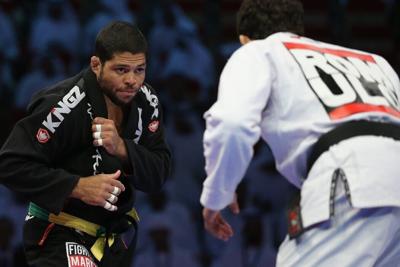 Andre Galvao, wearing black, competes in the Abu Dhabi World Professional Jiu-Jitsu Championship in 2014.