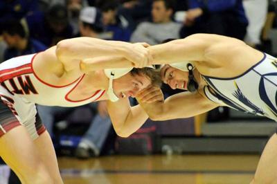 Eagle wrestlers boast three district champions, send five to state