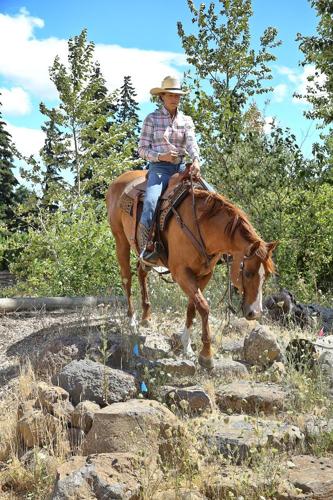 B1 USE Greta Hein coming down through the rocks practicing trail riding.jpg