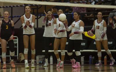 The Dalles volleyball team celebrates a point earlier this season.  Martin Gibson photo