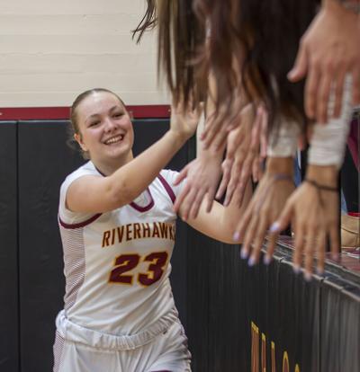 The Dalles junior Evelyn Rogers (23) greets fans before a game earlier this year.