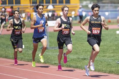 Juan Diego Contreras of The Dalles leads Gavin Humphreys  Isaiah Wapsheli and Adam Radabaugh in the 1500 (002).jpg