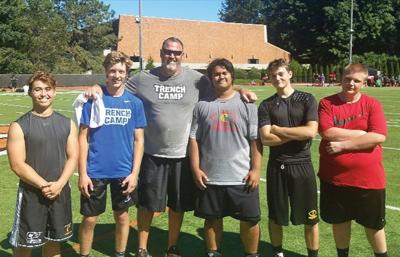 Football players take big strides at lineman camp