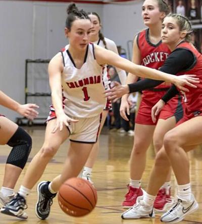 Columbia sophomore McKena Carlock (1) drives to the hoop last year