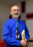 Pastor expands role to principal