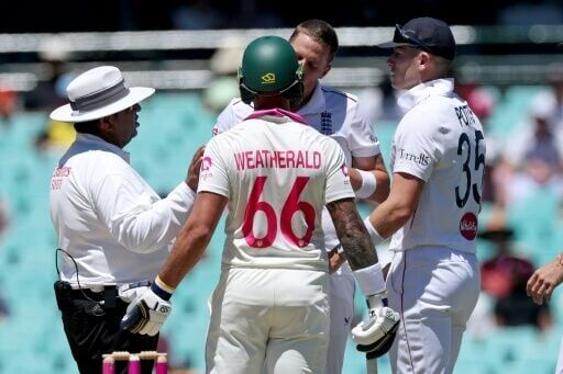 Tempers flared after another Snicko controversy with Brydon Carse (second right) clashing with the umpire and Jake Weatherald before being pulled away by Ben Stokes (right)