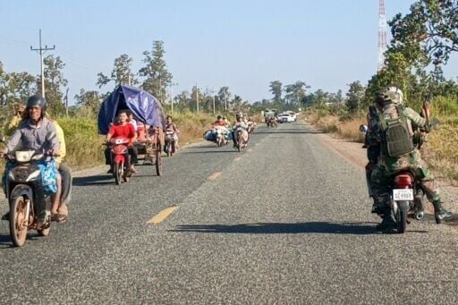 Cambodian residents flee following clashes along the border with Thailand