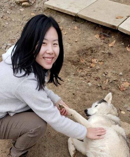 Dog owners who share a bed with their pets sleep more soundly than expected
