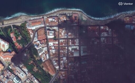 Handout satellite photo released by Vantor shows fire, smoke and roadblocks on the streets of Puerto Vallarta, Mexico after a military operation in the same state of Jalisco on February 22, 2026 led to the death of the country's most-wanted drug lord